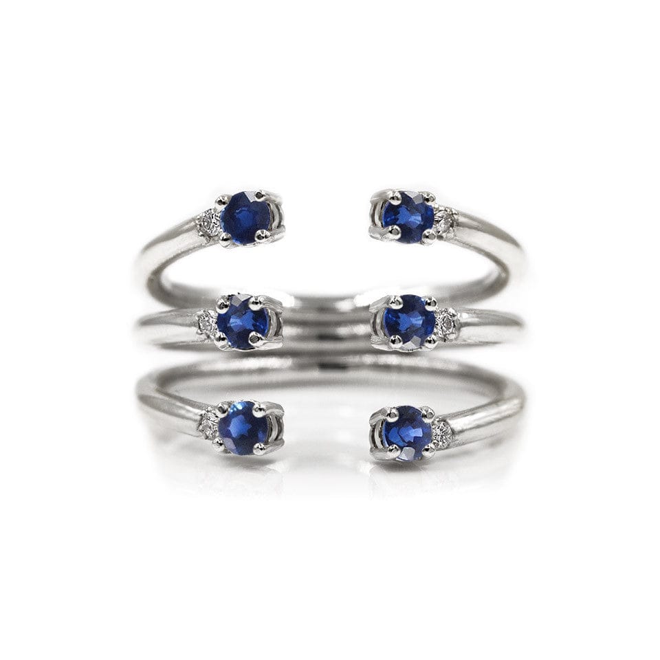 The Ally 14k whitegold diamond ring, blue sapphire, open design.