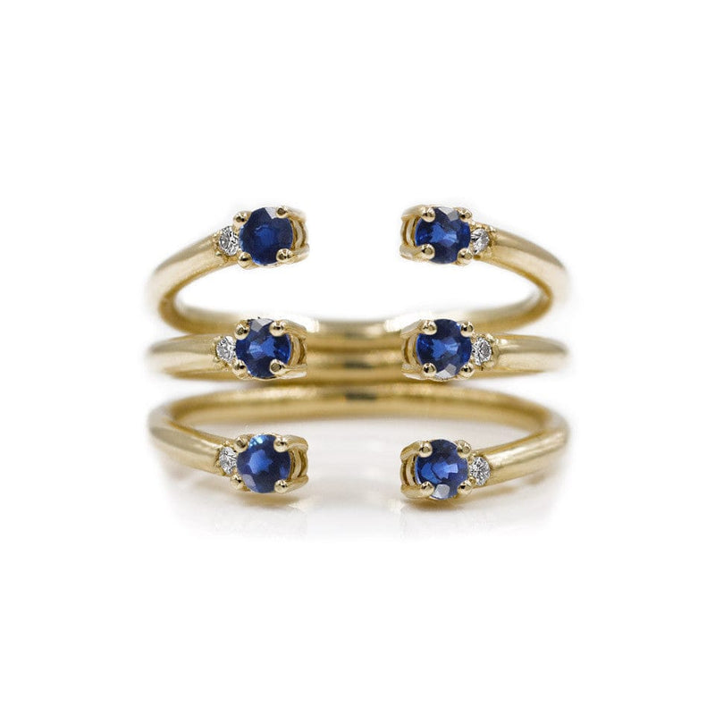 The Ally 14k whitegold diamond ring, blue sapphire, open design.